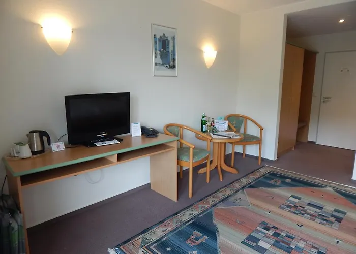 호텔 Garni Am Brunnenplatz 3*